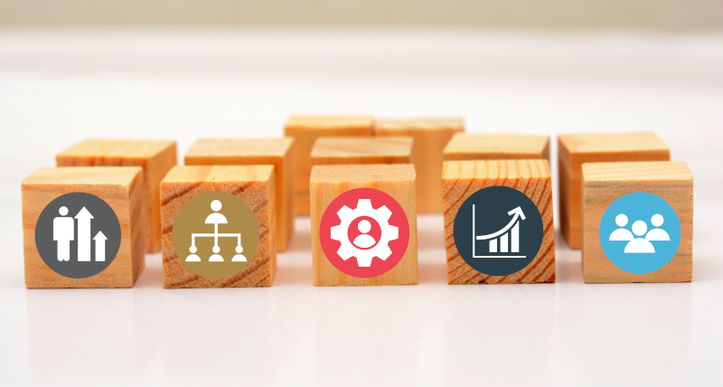 Business Growth and teamwork icons on wood dice. Business Growth and teamwork icons on wood dice.